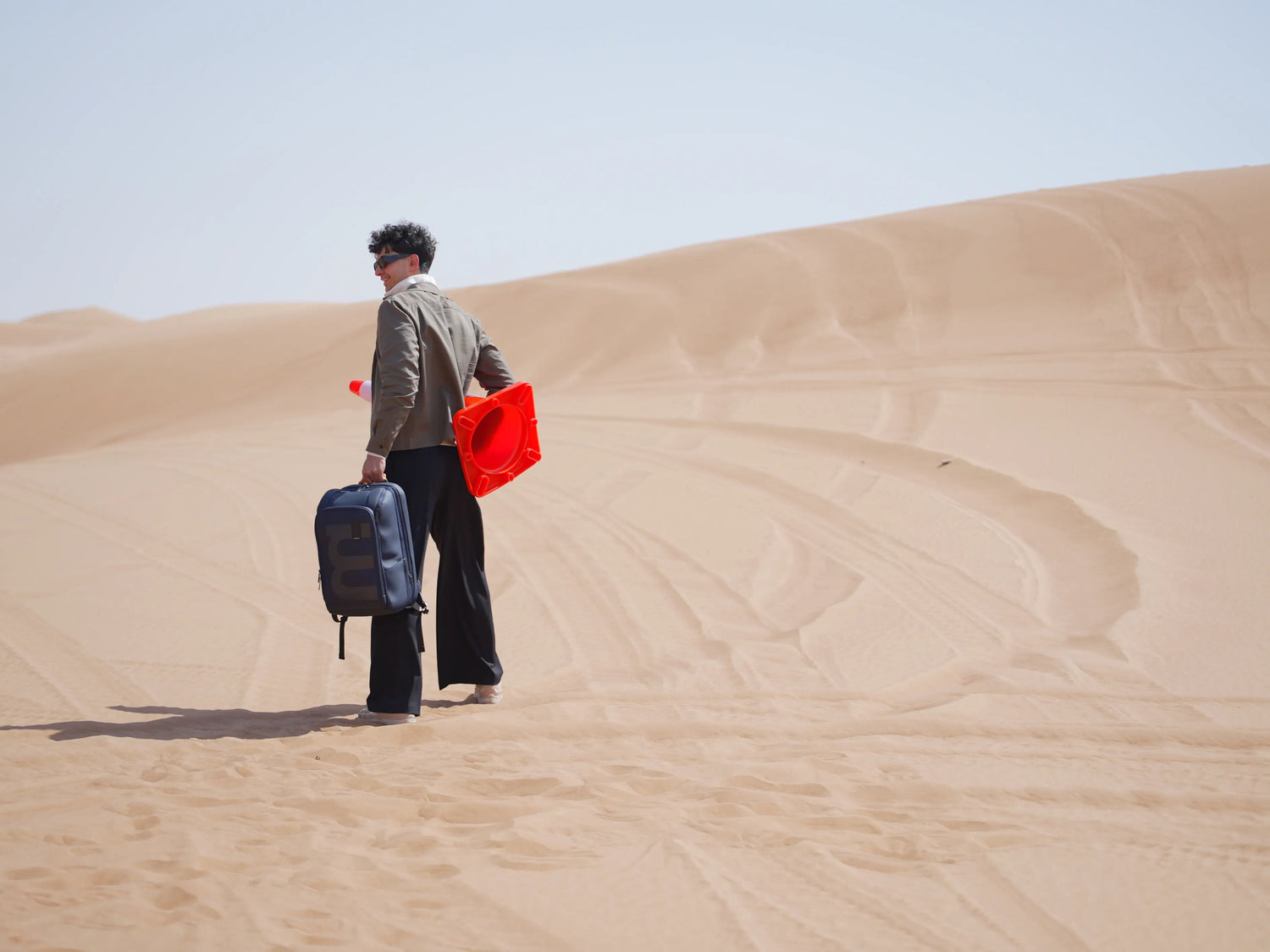 A solo traveler exploring a scenic destination with a backpack, map, and camera, embodying adventure and independence.